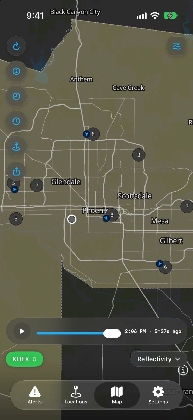 WeatherAlarm’s map over Phoenix with weather stations shown as live chips — each one a wind speed in miles per hour with an arrow for the direction it is blowing from.